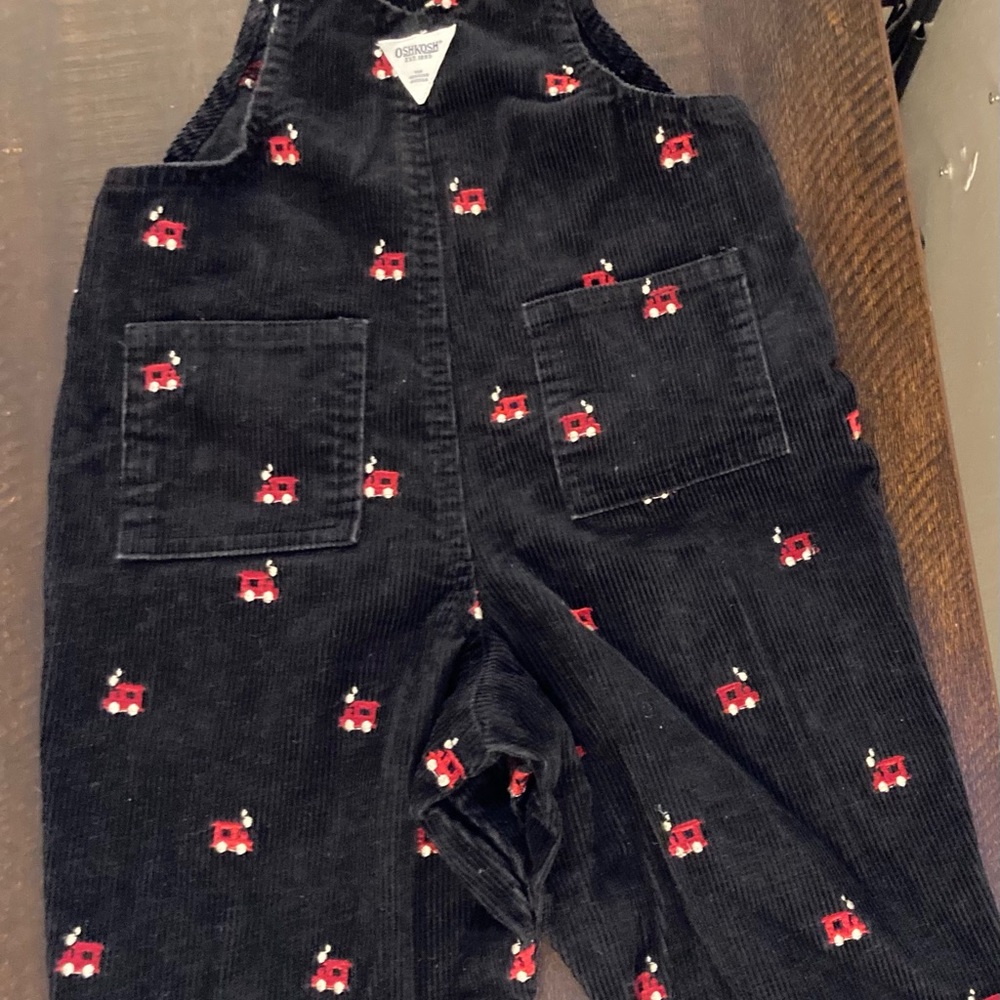 Six Christmas outfits and jackets, size 12 months.